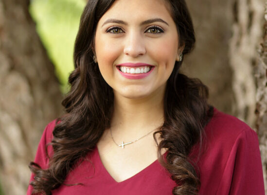 Professional photo of Marisa Seper, therapist, smiling outdoors