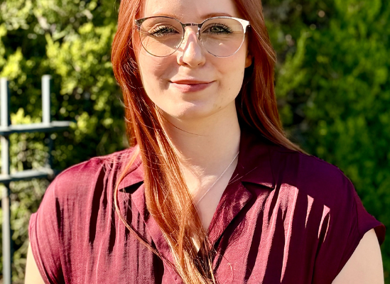 Professional headshot of Emma Beechen, therapist, smiling at camera