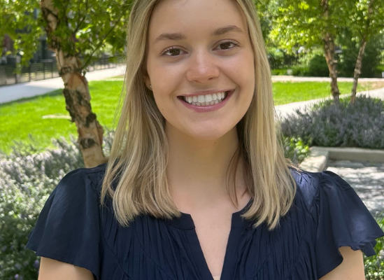 Professional photo of Emily Lytle, therapist, smiling outdoors